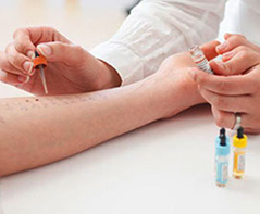 hands of a treating physician and the treated hand of a patient