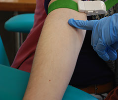 Image of a patient's arm prepared for giving blood samples for blood analysis